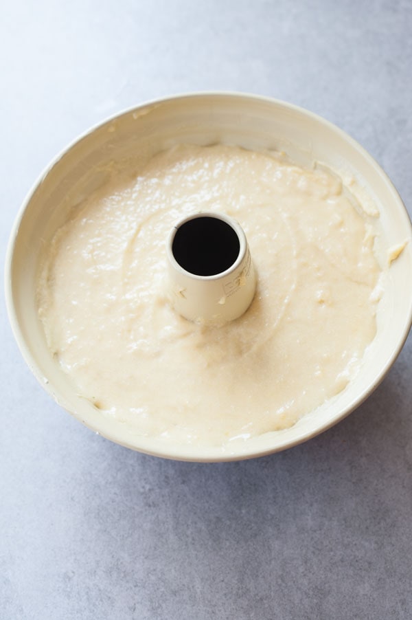 round bundt cake pan filled with cake batter