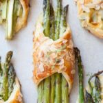 asparagus in puff pastry with cheese and ham