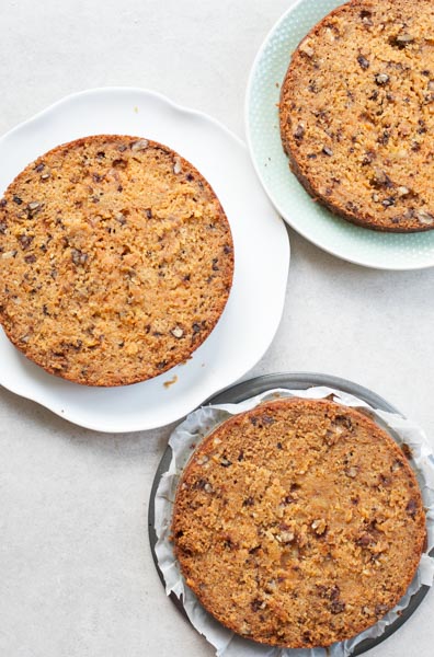 3 layers of carrot cake on plates