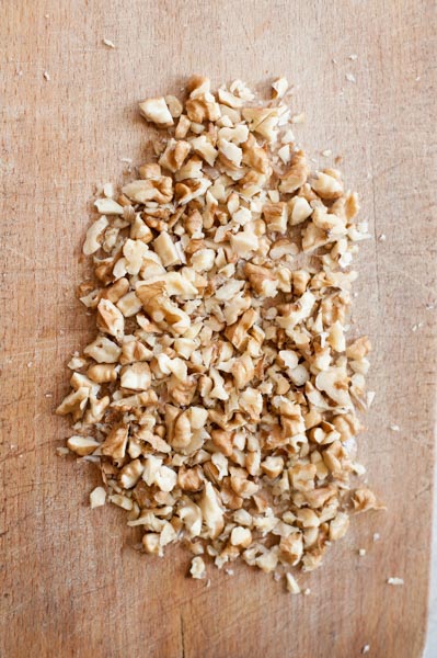 chopped nuts on a chopping board