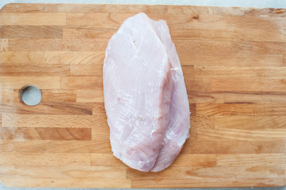 turkey breast on a chopping board