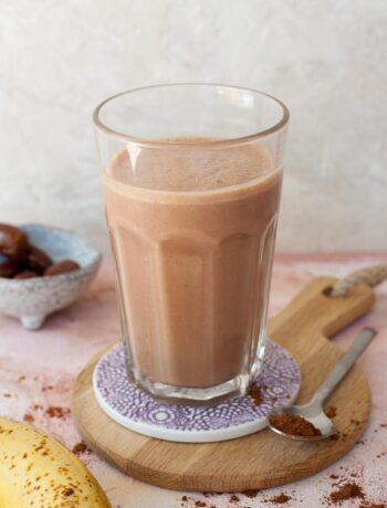 chocolate peanut butter banana smoothie in a glass