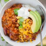 Turkey pumpkin chili in a white bowl.