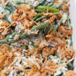 Green bean casserole in a white baking dish.