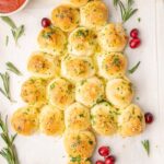 Pull-apart Christmas tree on a baking sheet lined with parchment paper.