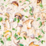 Creamy mushroom sauce in a frying pan.