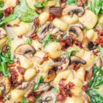 Mushroom gnocchi with spinach and bacon.