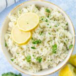 Lemon rice in a white bowl.