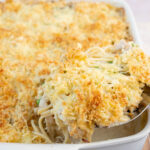 Turkey Tetrazzini in a white casserole dish.