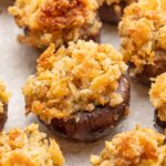 Stuffed mushrooms on a grey background.