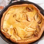 German apple pancake in a cast iron pan.